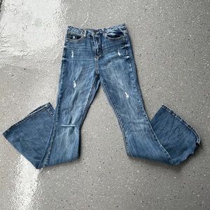 Distressed flare denim jeans